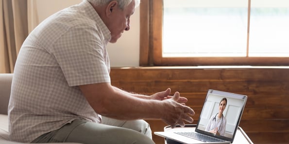 Patient having a televisit appointment with his doctor on the iPad