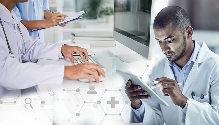 Two healthcare professionals using a Mac computer and the other using a tablet.