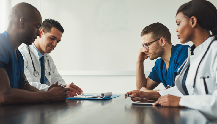 Medical staff planning a continuous patient education plan