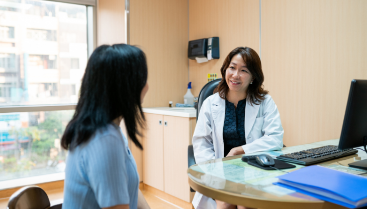 A primary care provider actively listening to a patient