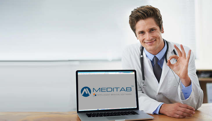 A male doctor gesturing the OK sign while showing his medical office software from his laptop.