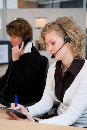 Front desk of a medical office taking calls