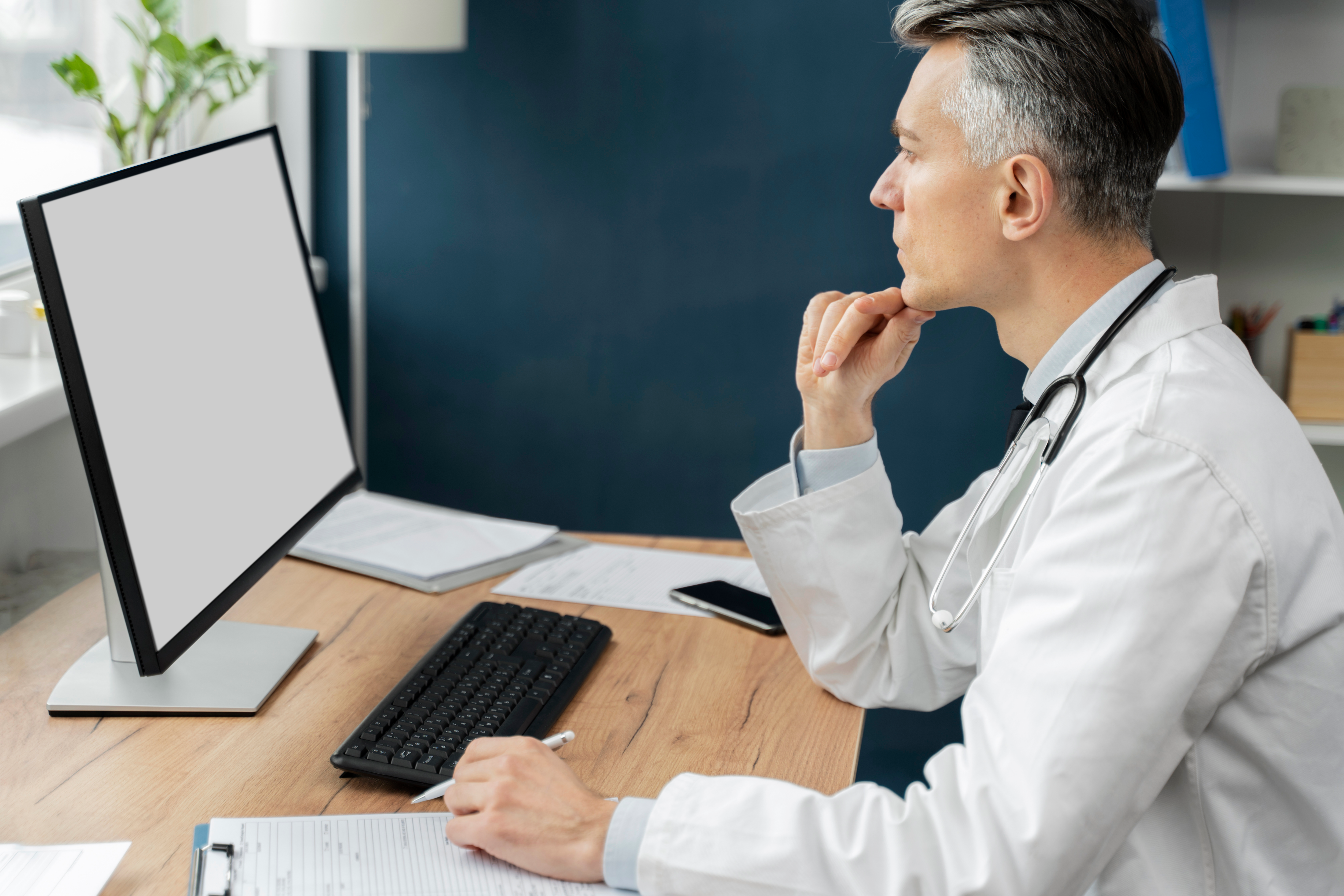 A healthcare professional using Electronic Health Record (EHR)