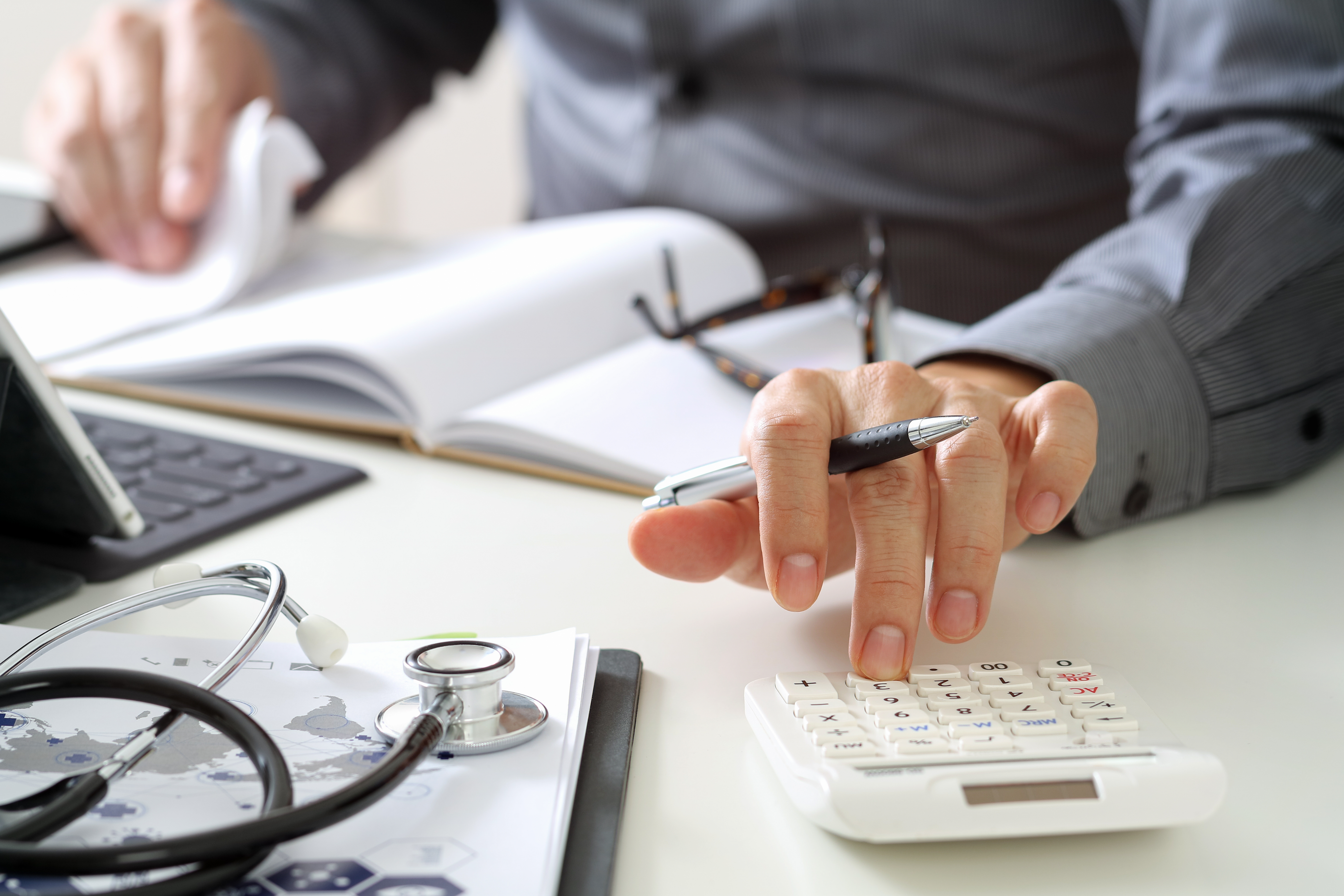 A billing staff member keeping track of their practice’s cash flow