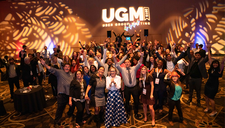 A large group of people gathered together during Meditab's UGM event.