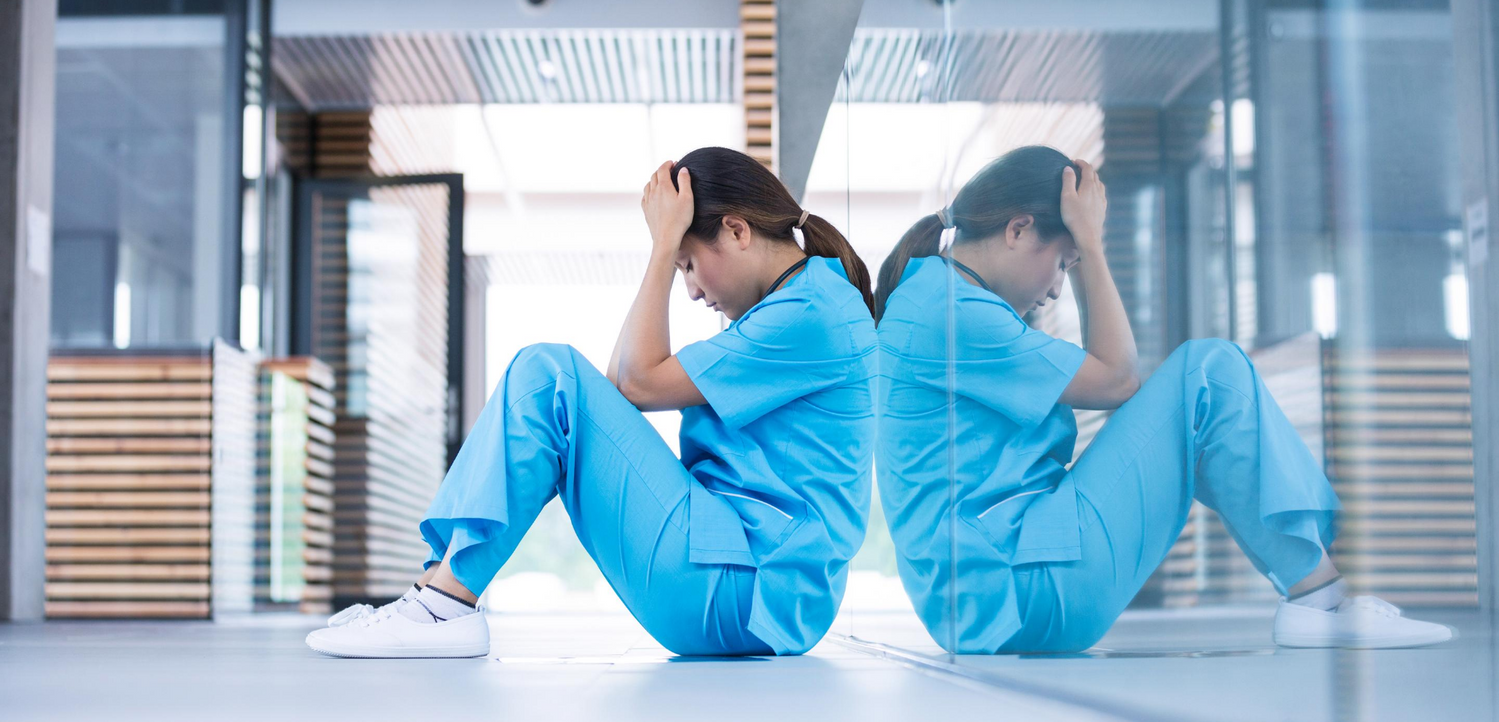 A stressed nurses dealing with burnout during the COVID-19 pandemic