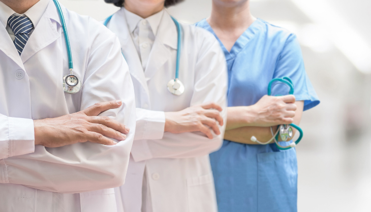 Community Health doctors at a FQHC standing together
