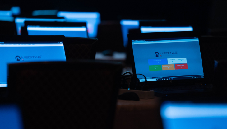 Meditab Displayed on a Bank of Computers for a Virtual Summit