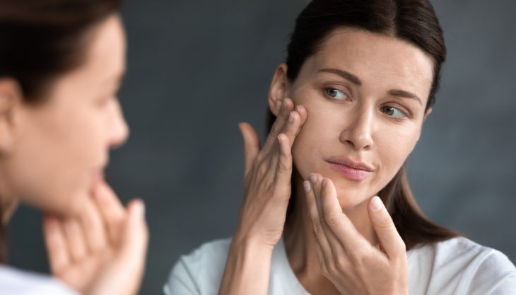 Woman Contemplating a Facelift after seeing Online Practice Marketing