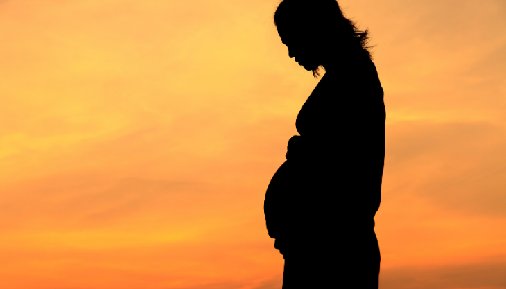 A pregnant woman who went to a fertility clinic during the pandemic