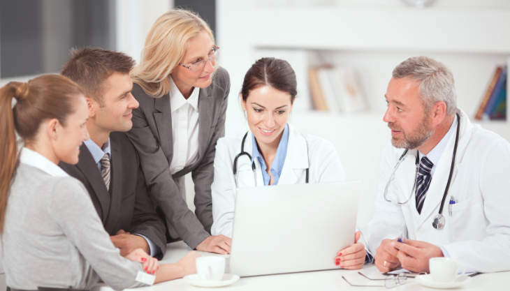 Staff of a Medical Clinic Discuss the Business Strategies for Their Practice