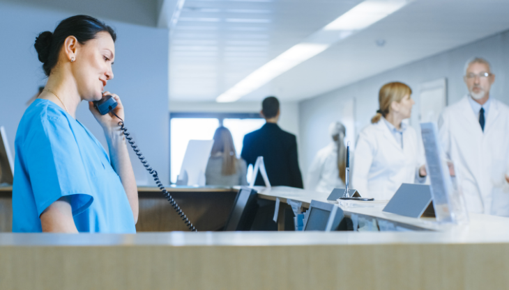 Receptionist on phone at the hospital 