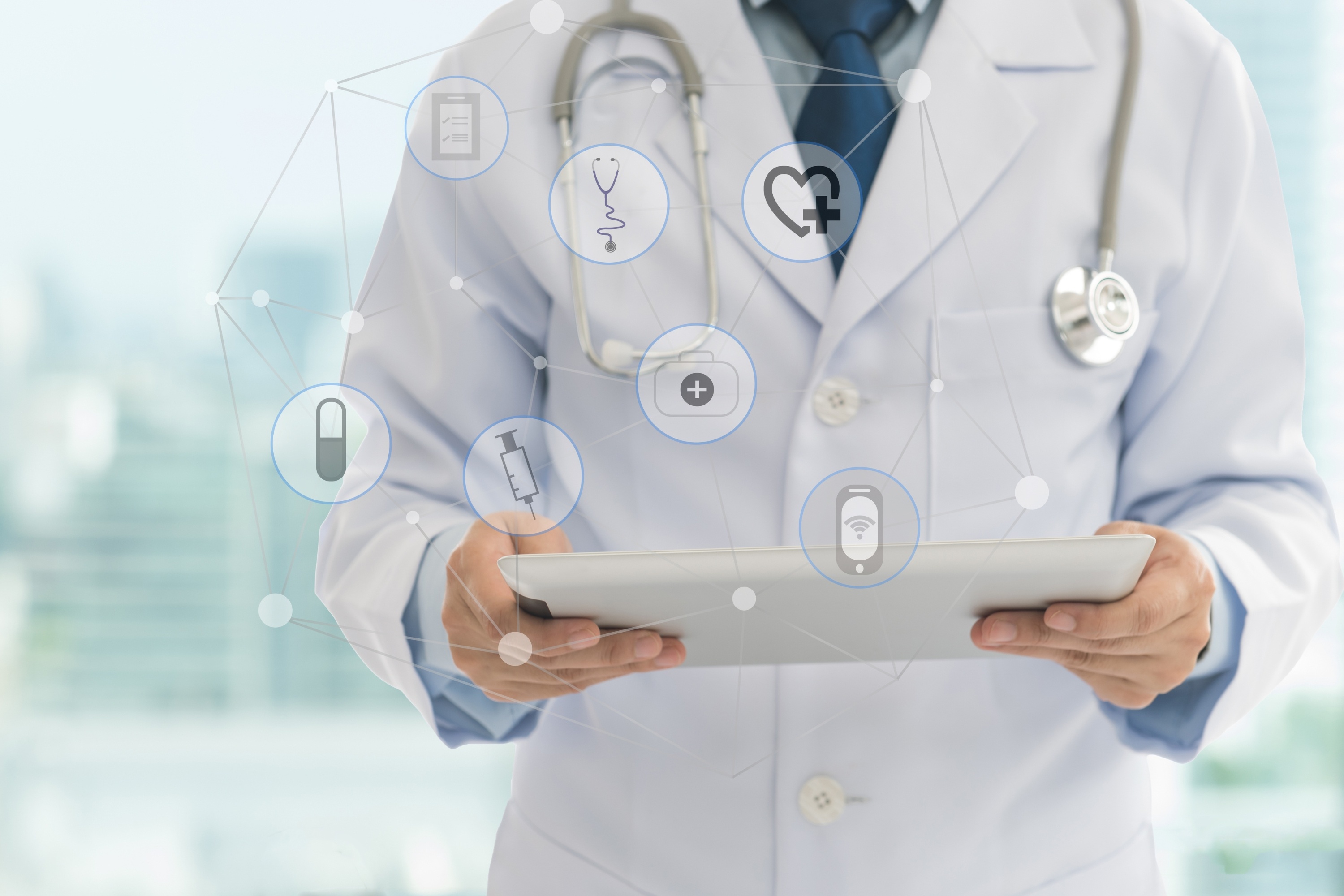 Doctor using an integrated EHR system to comply with new information blocking rules